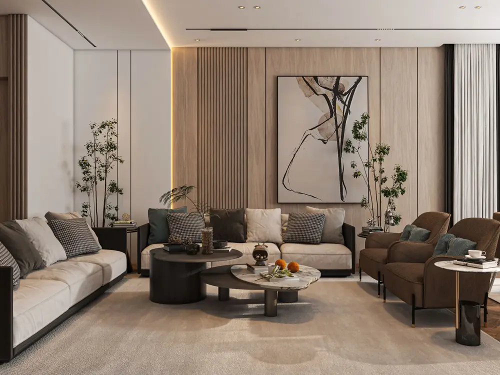 Warm, neutral lounge with two brown armchairs, a cream sofa, timber wall panels and indoor plants